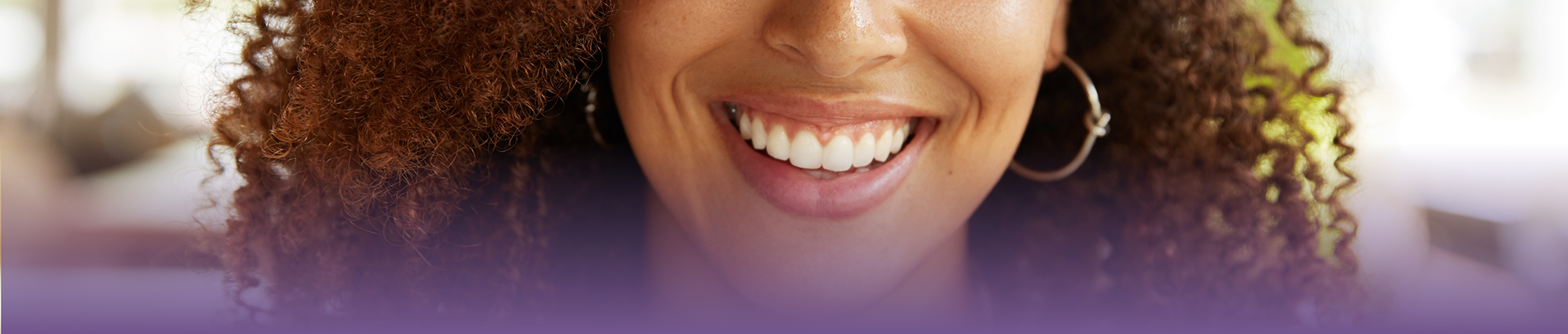 Woman smiling with flawless teeth after cosmetic dentistry in Keokuk