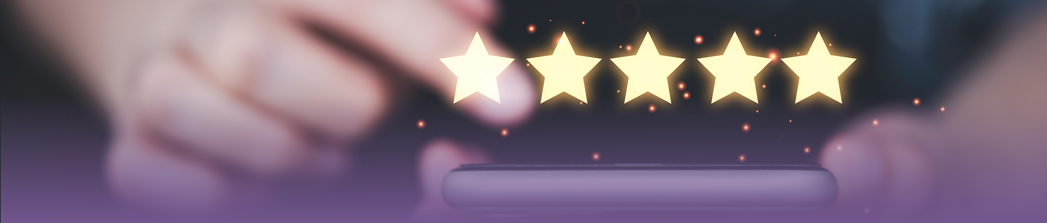 Person leaving a five star review on their phone